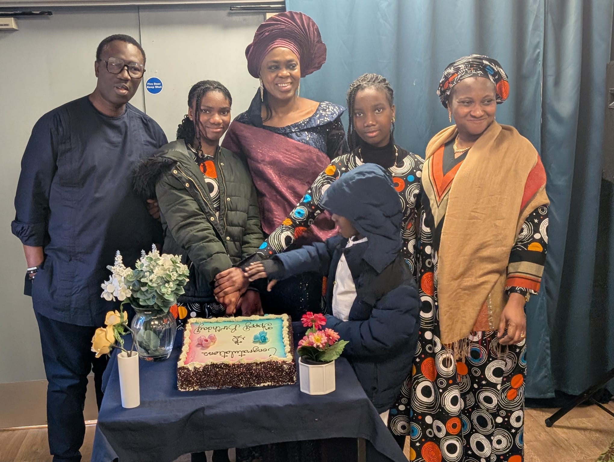 Grace Church Keighley members in traditional dress at a service